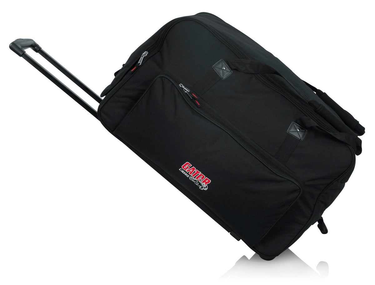 Rolling speaker bag for large format 12" speakers including Mackie SRM450v2, JBL MRX512MM, Yamaha MSR400, Peavey Impulse 12D, EV ELX112P, Behringer EUROLIVE B412DSP and Harbinger ASP12