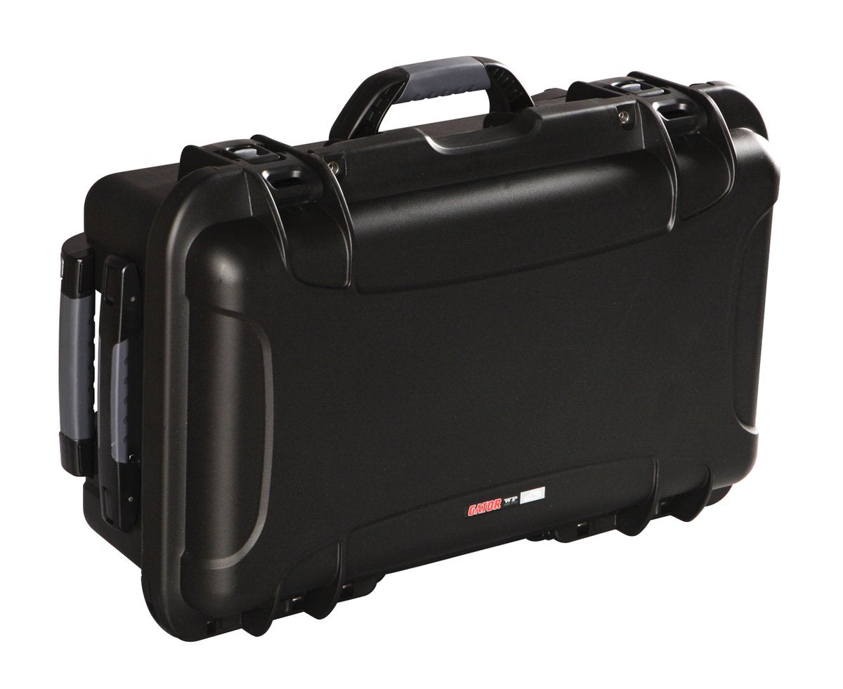 Black waterproof injection molded case with pullout handle and inline wheels. Interior dimensions of 20.5" x 11.3" x 7.5". INTERNAL DIVIDER SYSTEM