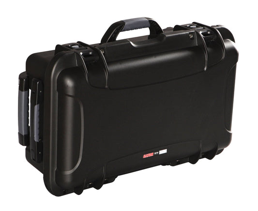 Black waterproof injection molded case with pullout handle and inline wheels. Interior dimensions of 20.5" x 11.3" x 7.5". INTERNAL DIVIDER SYSTEM