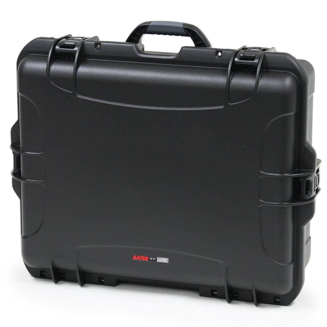 Black waterproof injection molded case with interior dimensions of 22" x 17" x 8.2". DICED FOAM