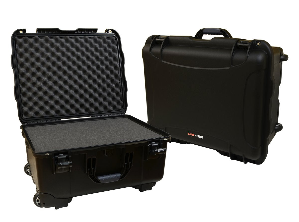 Black injection molded case with pullout handle, inline wheels, and Interior dims 20.5" x 15.3" x 10.1". DICED FOAM