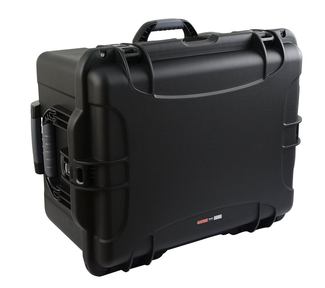 Black injection molded case with pullout handle, inline wheels, and interior dims 22" x 17" x 12.9". DICED FOAM